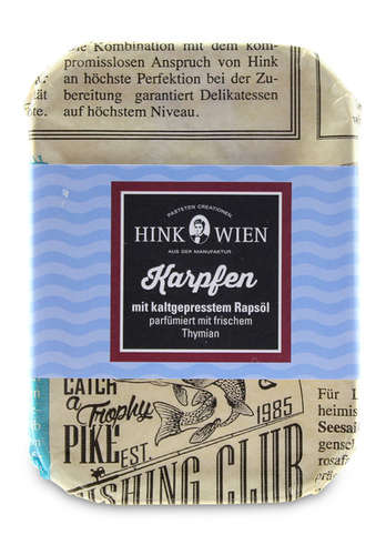 Karpfen parfümiert mit Thymian in der Dose Karpfen parfümiert mit Thymian in der Dose